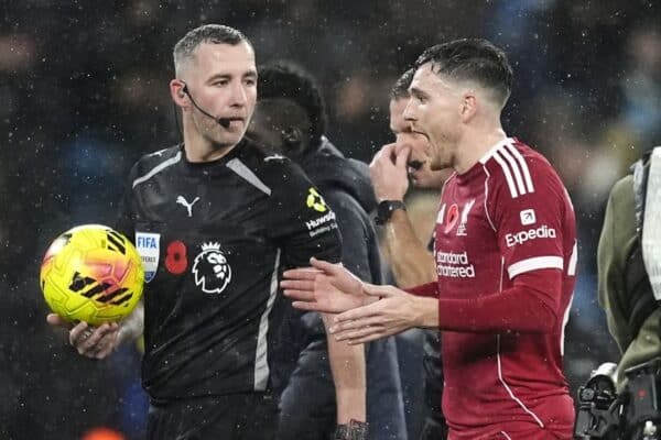 Liverpool defender Andrew Robertson, controversially ruled offside as a Virgil van Dijk equaliser was disallowed, talks to referee Chris Kavanagh (Nick Potts/PA)
