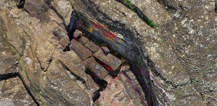 figures carved into a rock formation