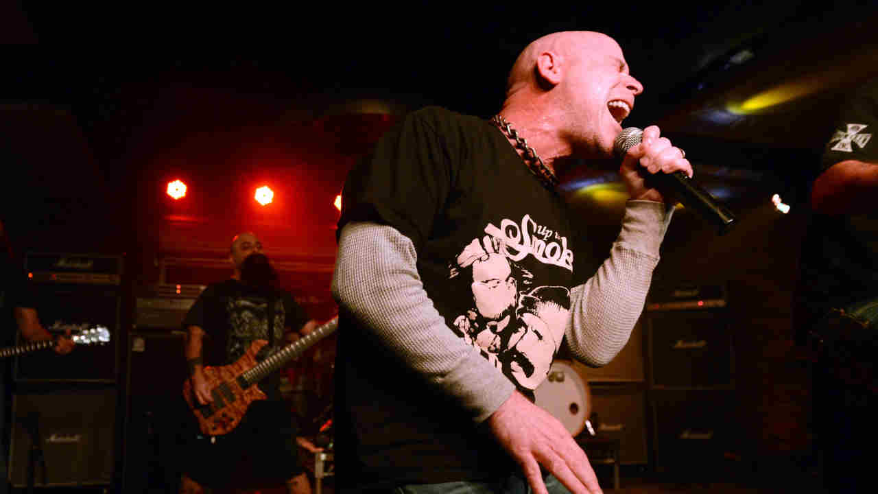 Armored Saint&rsquo;s John Bush performing onstage in 2016