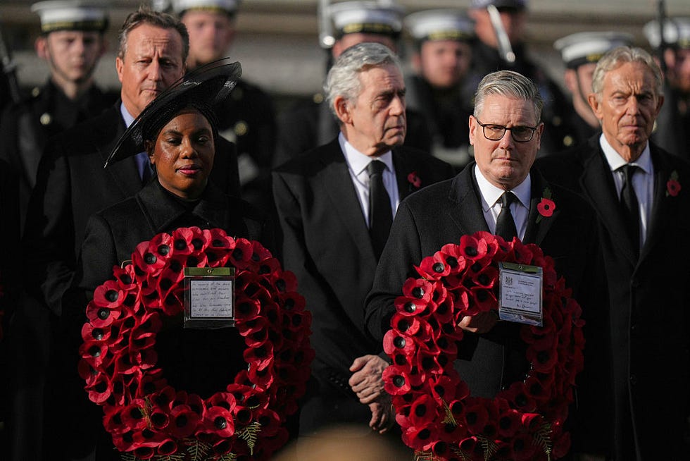 The 2025 National Service Of Remembrance At The Cenotaph london, england november 9: (ltor behind) former prime ministers david cameron, gordon brown and tony blair as britains prime minister keir starmer and kemi badenoch, leader of britains conservative party, carry a wreath during the remembrance sunday ceremony at the cenotaph on whitehall on november 9, 2025 in london, england. every year, members of the british royal family join politicians, veterans and members of the public to remember those who have died in combat. (photo by alastair grant wpa pool/getty images)