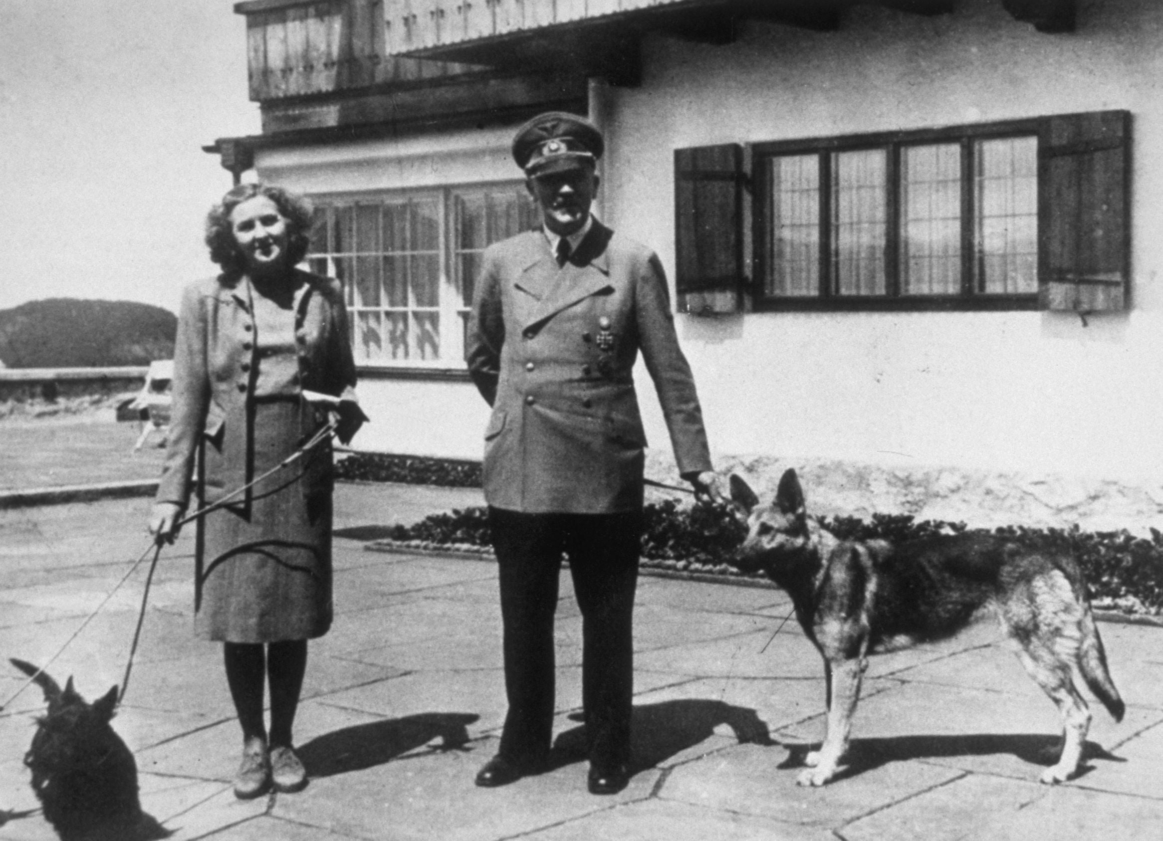 Hitler with his partner Eva Braun and their dogs at Berchtesgaden