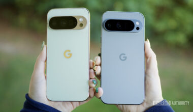 Someone holding the Pixel 10 Pro and Pixel 9 Pro, showing the backs of the phones.