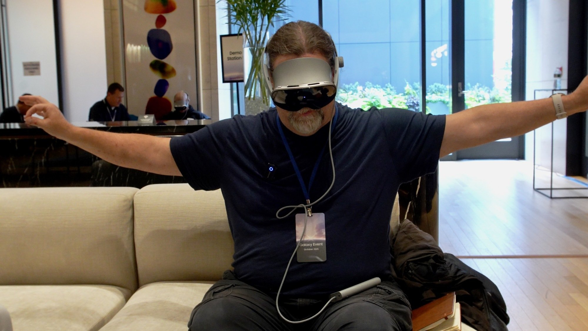 adam doud wearing samsung galaxy xr headset and using hand controls