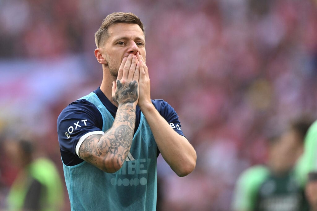 Liam Cooper blows kisses to the Leeds fans