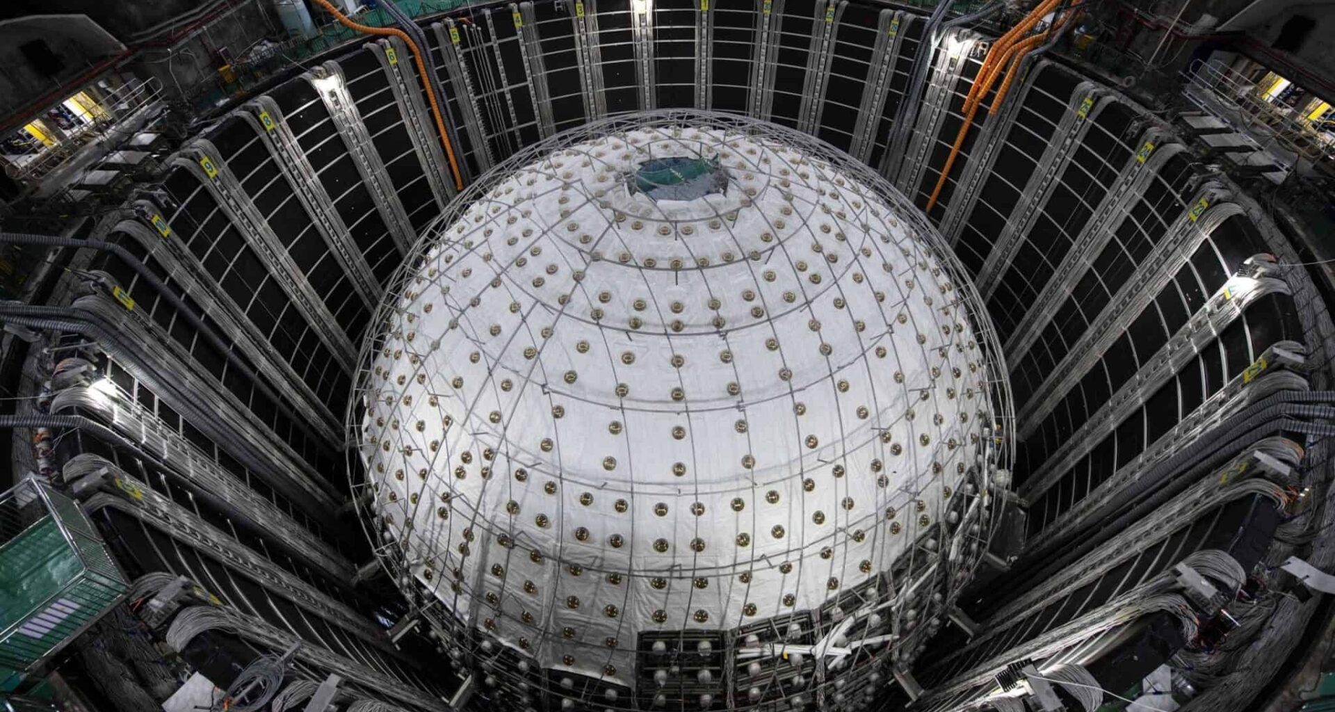 Photo of the large sphere of the central detector of the Jiangmen Underground Neutrino Observatory