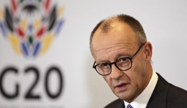 Germanys Vice Chancellor and Finance Minister Lars Klingbeil (L) and German Chancellor Friedrich Merz give a press conference at a hotel in Sandton on Nov. 23, 2025 on the sidelines of the G20 Leaders Summit. (AFP Photo)