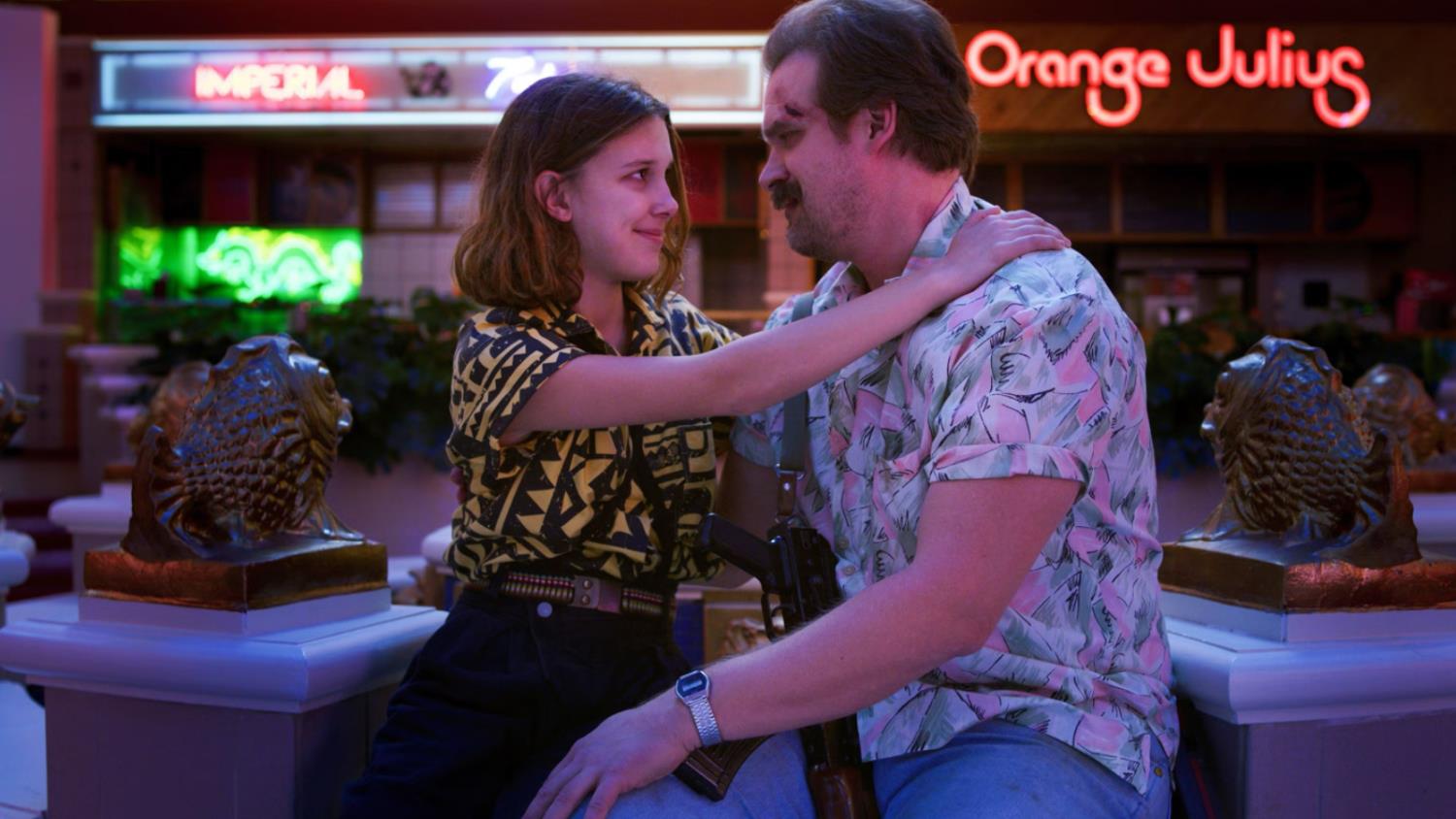 Millie Bobby Brown Says She Felt “Safe” With David Harbour While Filming STRANGER THINGS Season 5