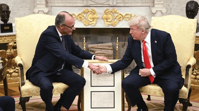 U.S. President Donald Trump and German Chancellor Friedrich Merz shake hands during a bilateral meeting in the Oval Office of the White House on June 5, 2025. (Brendan Smialowski/AFP via Getty Images)