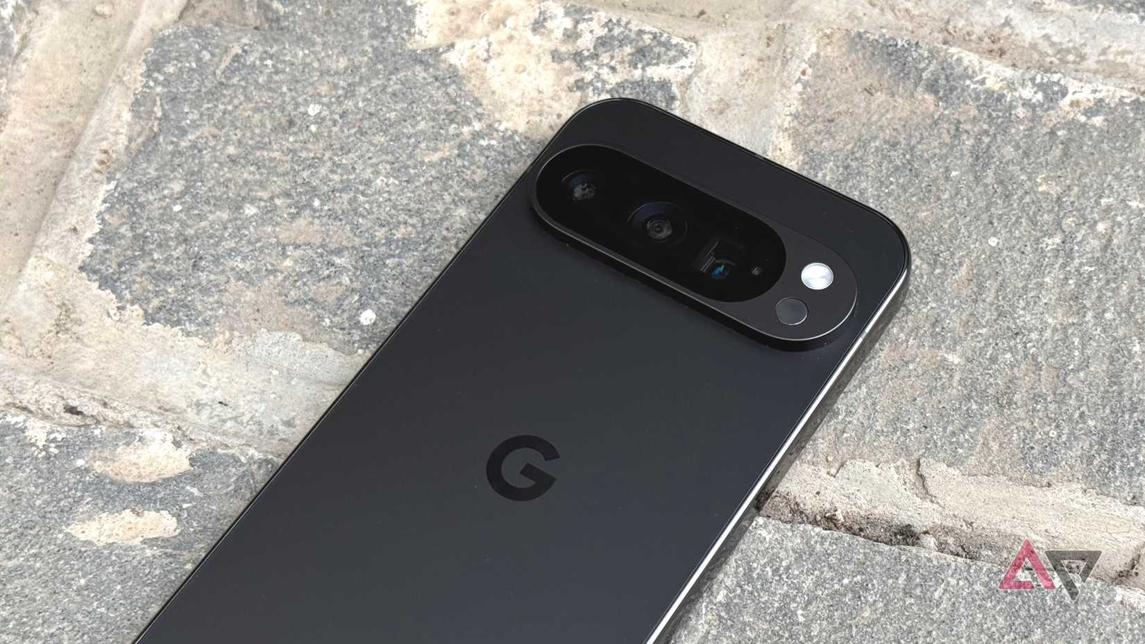 Pixel 9 Pro lying on a stone bench