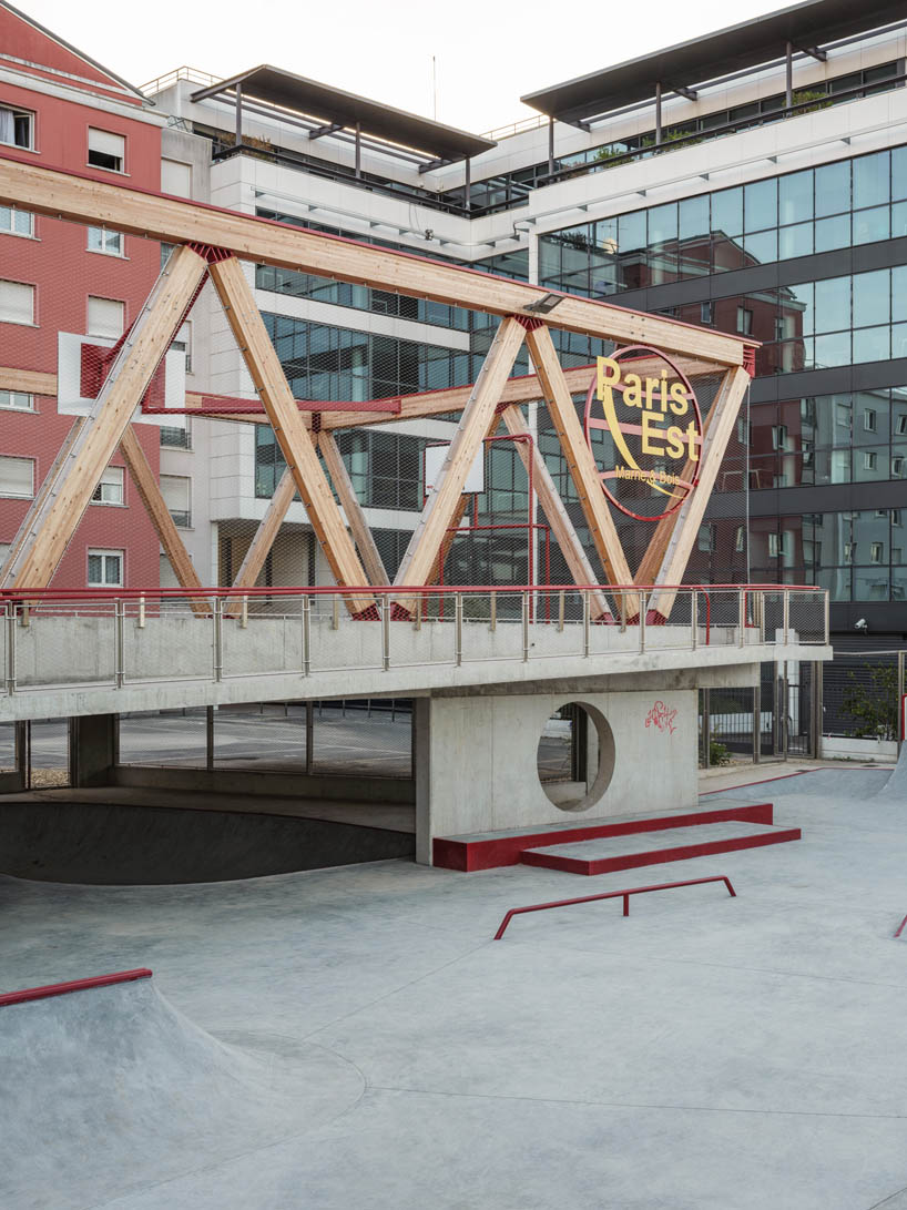 cantilever sports court crowns urban skatepark bowl along railway in france