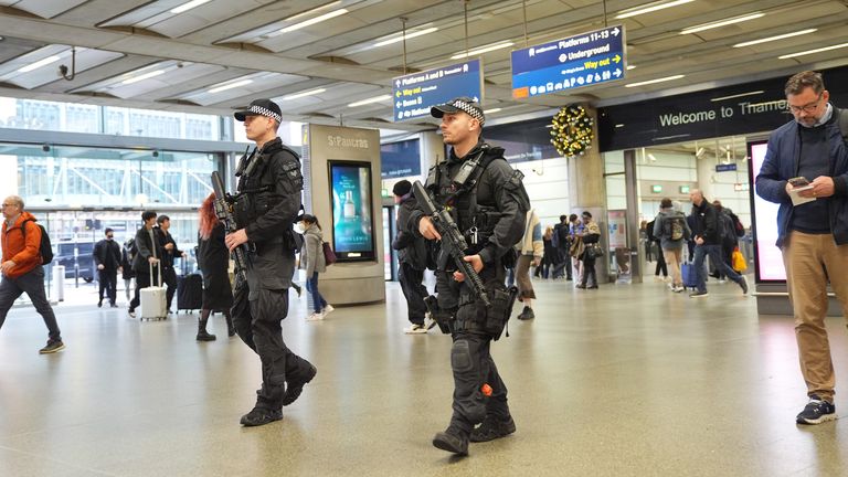 Armed police officers on patrol at St Pancras International station on Monday morning. Pic: PA