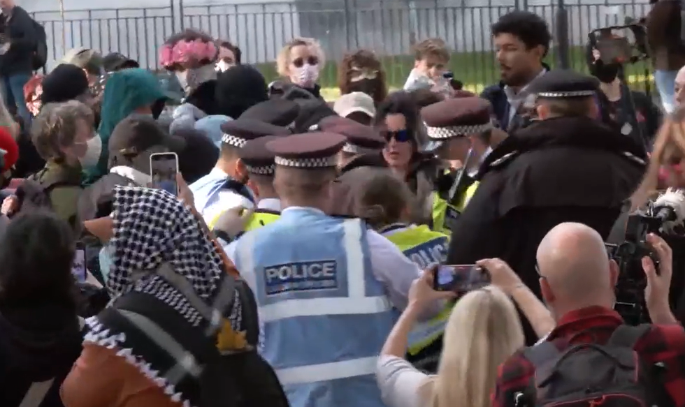 The Metropolitan Police were seen rushing in as trans activists clash with pro-women's rights campaigners