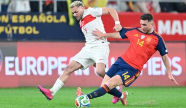 Baris Alper Yilmaz of Türkiye in action against Aymeric Laporte of Spain during the FIFA World Cup 2026 qualifier football match between Spain and Türkiye at Estadio de La Cartuja in Seville, Spain on Nov. 18, 2025. (AA Photo)
