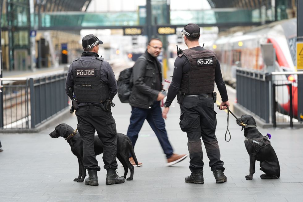 \u200bPolice officers at London King's Cross station