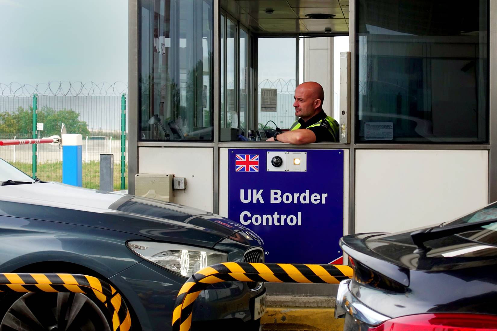 UK Border Force police checking cars at the Eurotunnel terminal