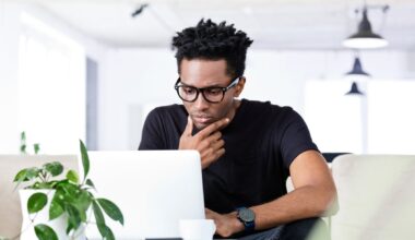 A person looking at a computer.