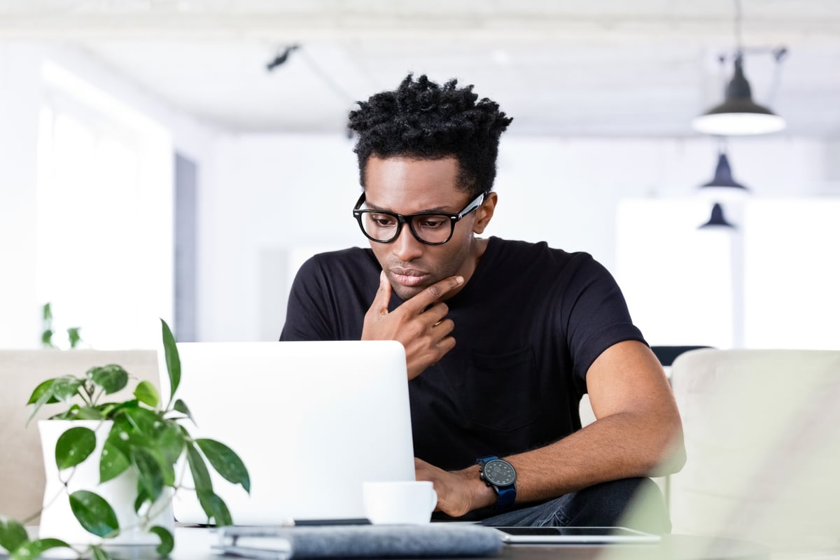 A person looking at a computer.