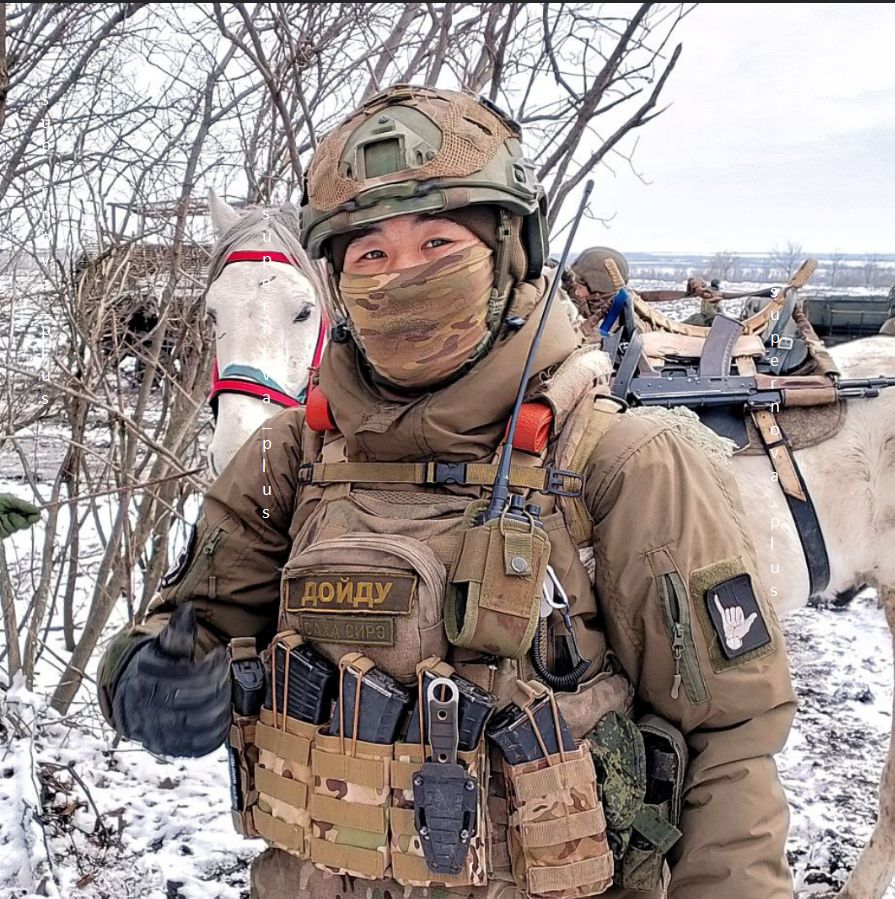Russian soldier with horses and donkeys in a snowy, bare tree landscape.