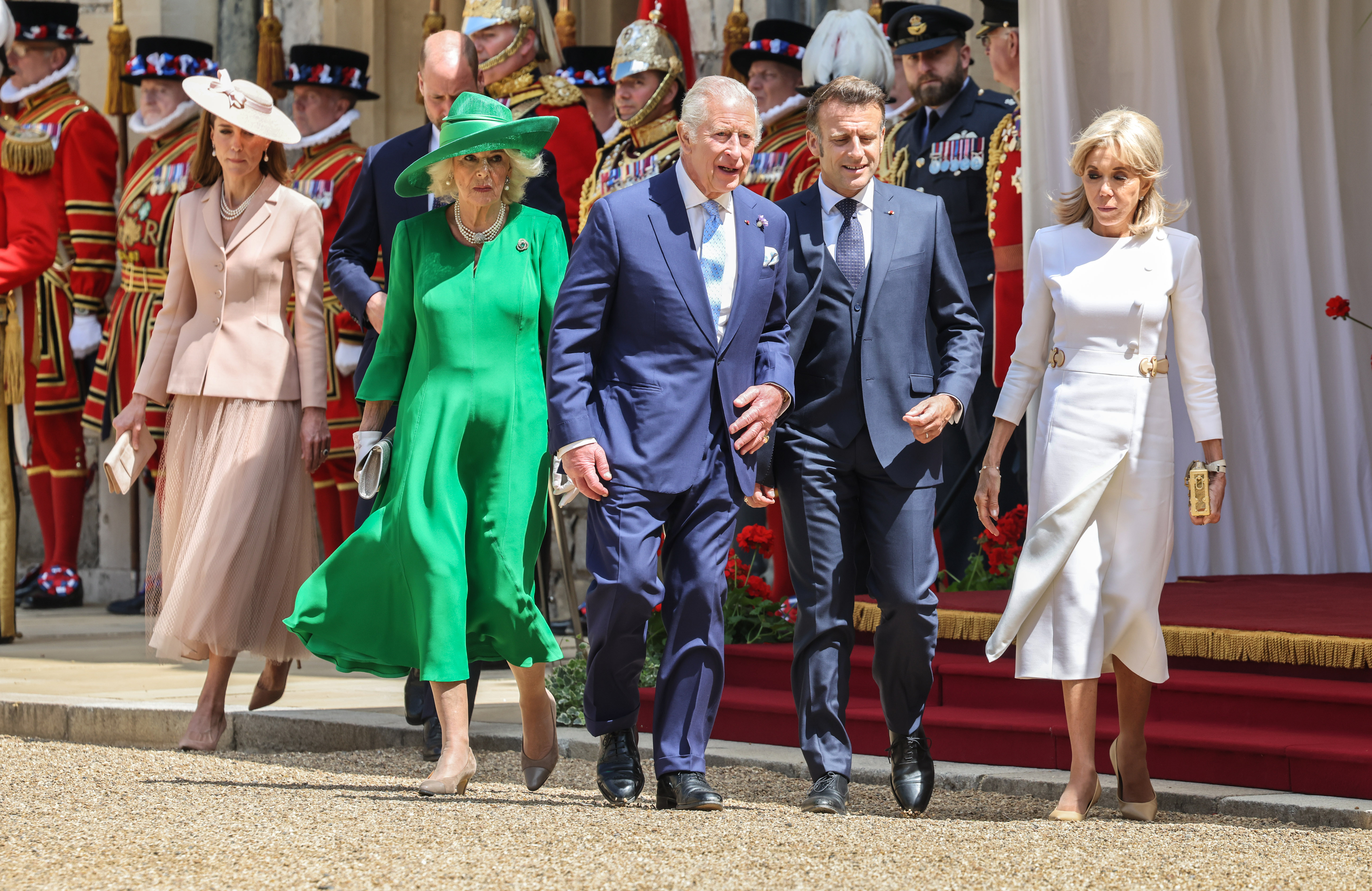 King Charles III and President Macron inspecting the guard of honor at Windsor Castle.