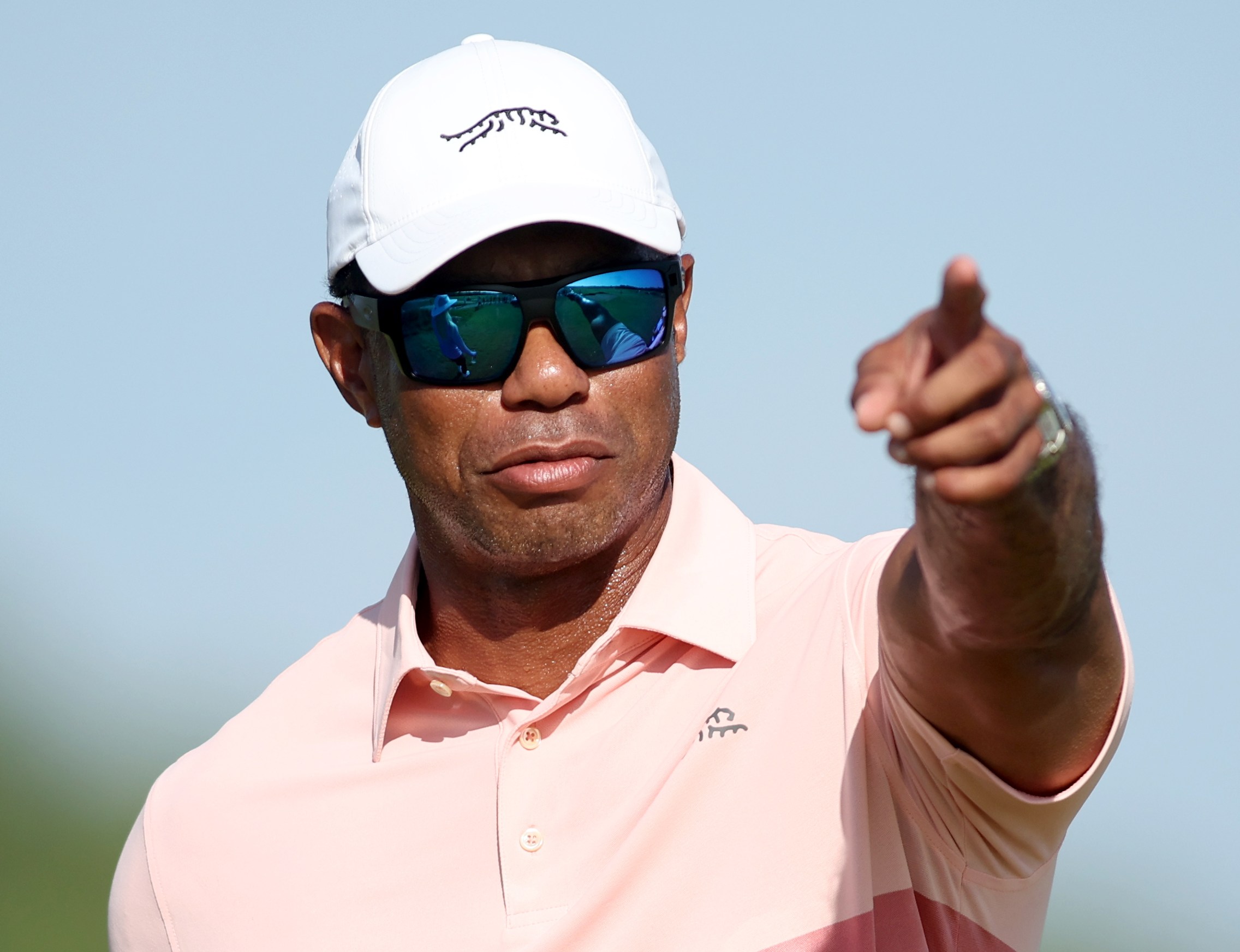 Tiger Woods on the course pointing during the second round of the U.S. Junior Amateur.