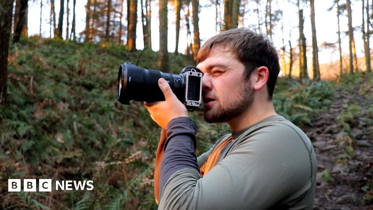 William Hickie taking a photograph