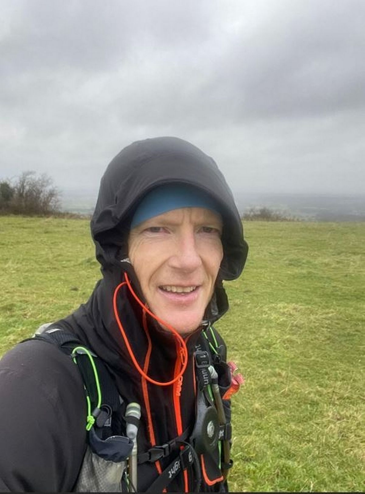 Anthony Groves braving Storm Darragh last year to complete a 55 mile ultra marathon to raise £9,900 for Salford Lads and Girls Club