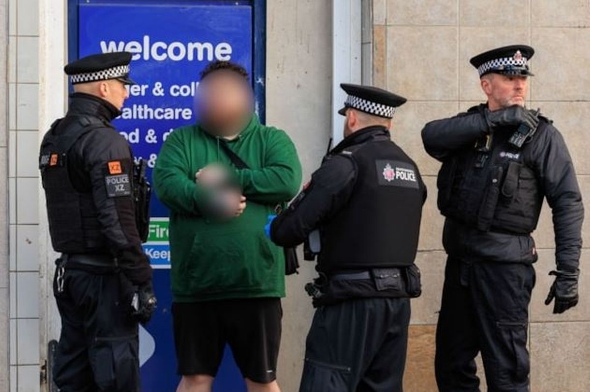Police make an arrest in the city centre.