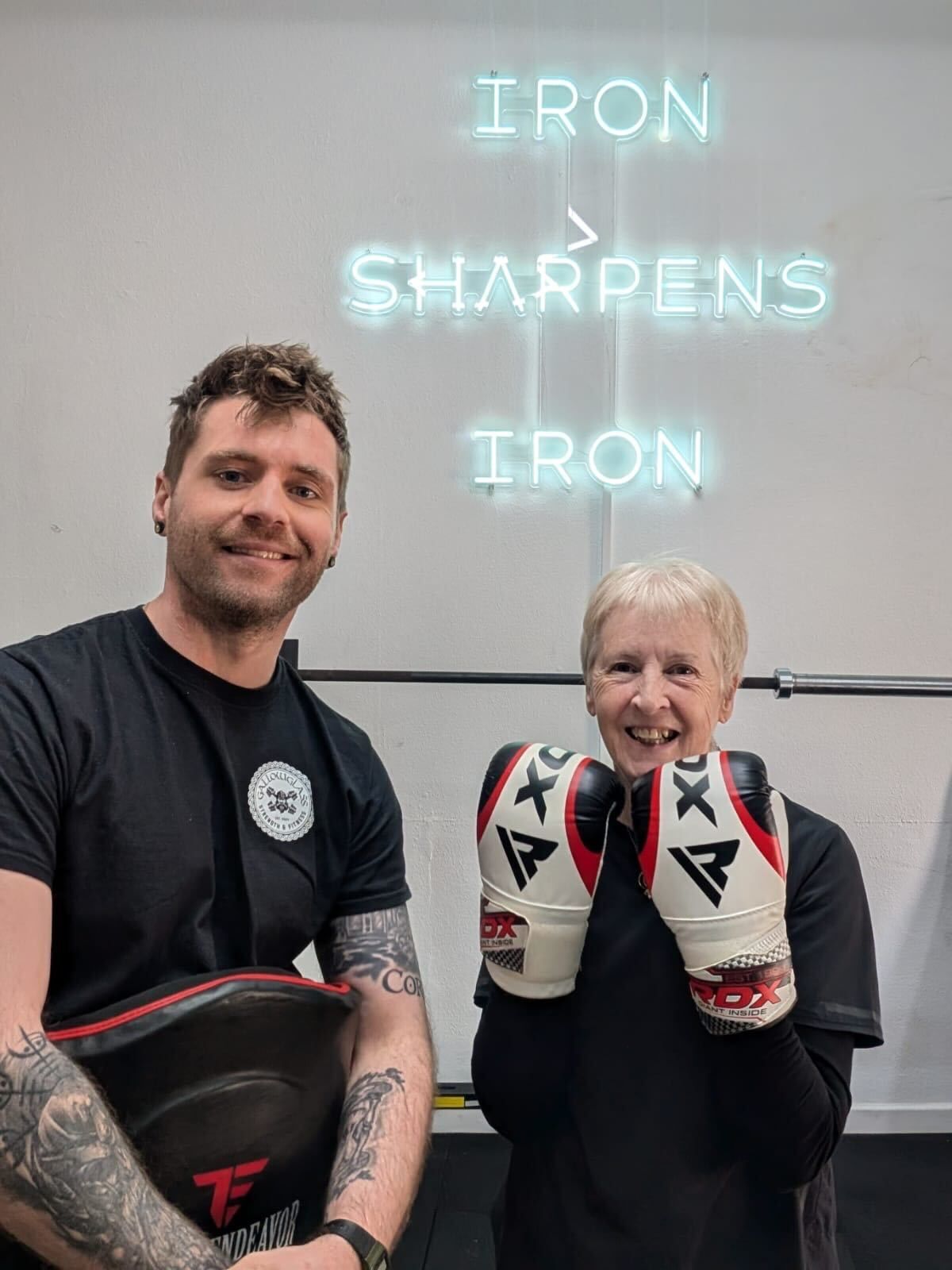 Lily Gamble with her boxing coach Tom
