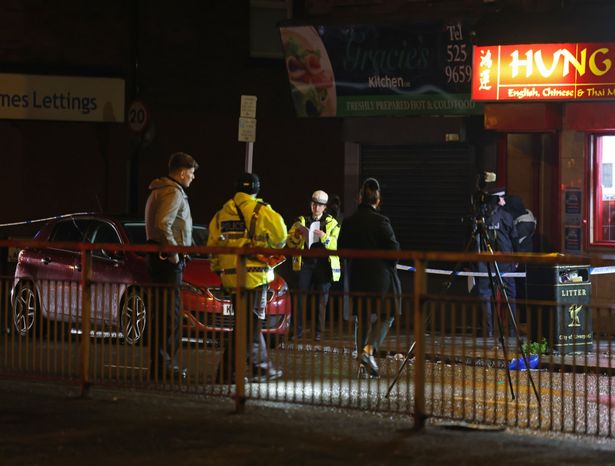 Police and forensic officers on Longmoor Lane