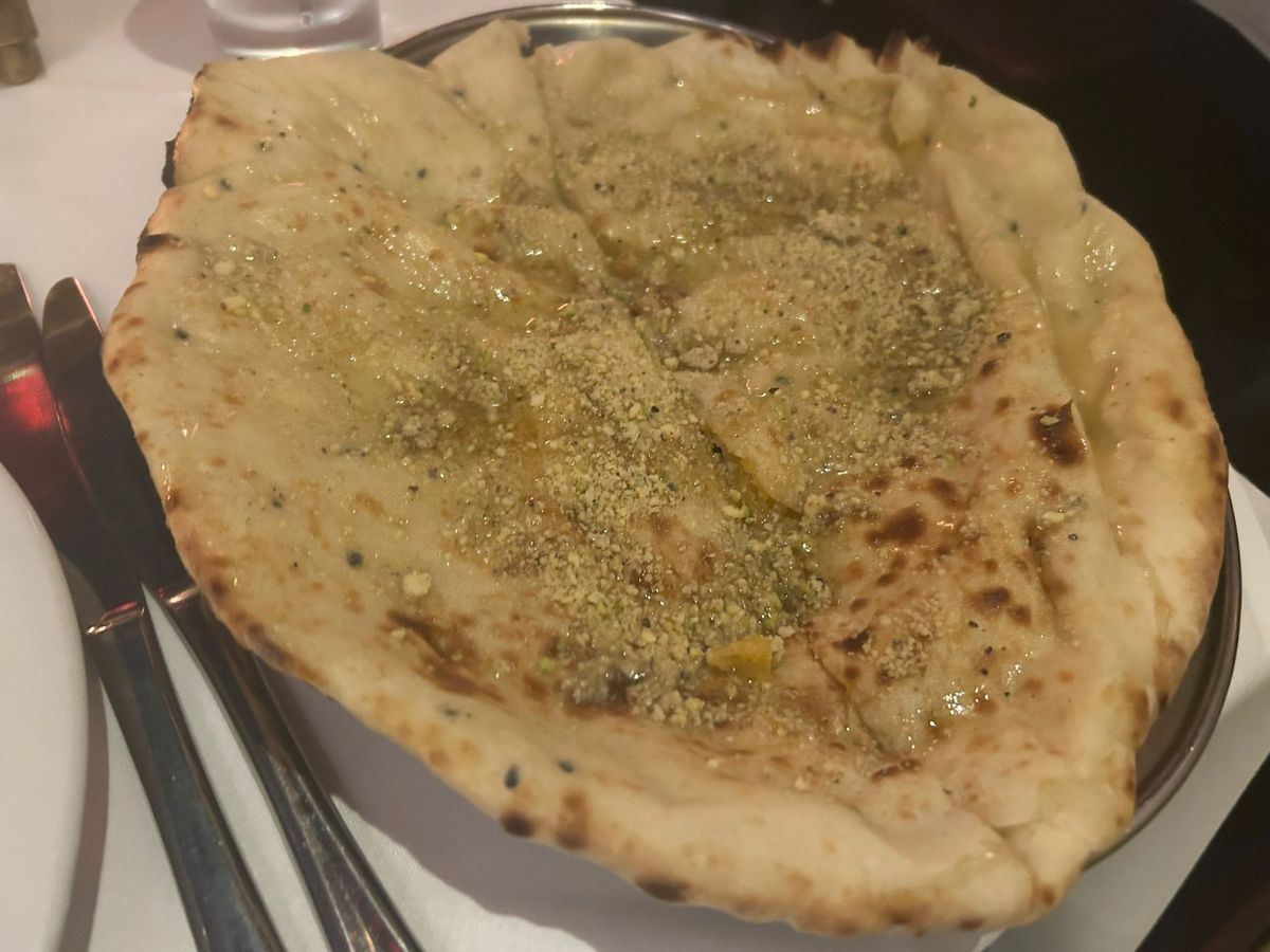 The Peshwari Naan (£5.50) was a sweet delight, with almonds, coconut and honey