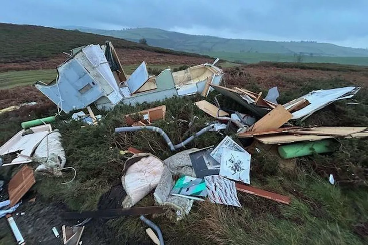 Debris believed to be from a caravan on Moel Unben above Llanfairtalhaiarn near Abergele in Conwy