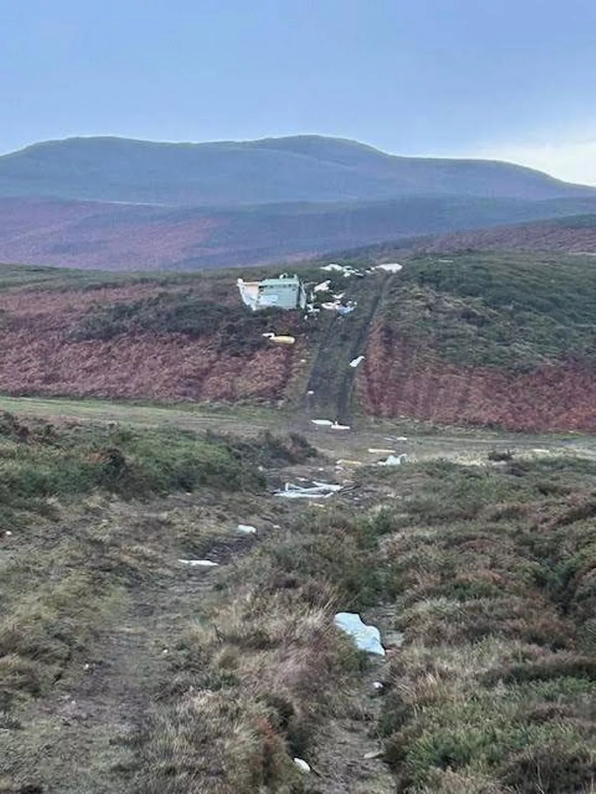Debris believed to be from a caravan on Moel Unben above Llanfairtalhaiarn near Abergele in Conwy
