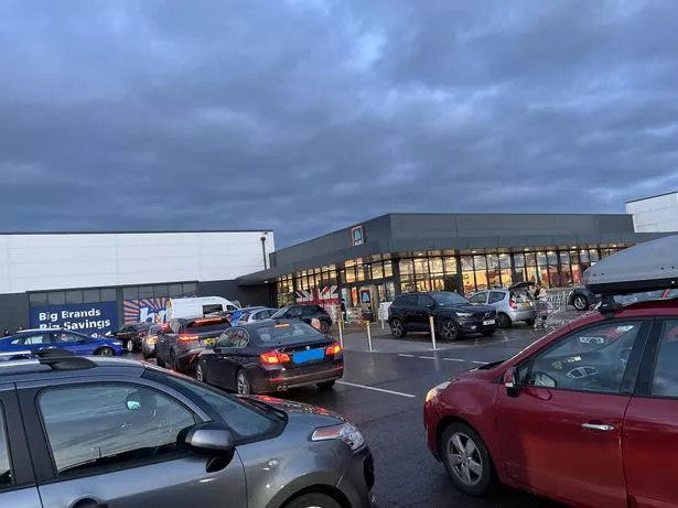 Motorists queuing to leave the car park on Sunday afternoon