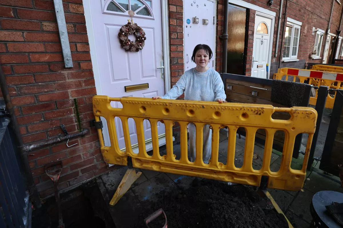 Rachel Flynn at her home at Elm House in Prescot without water for several days.