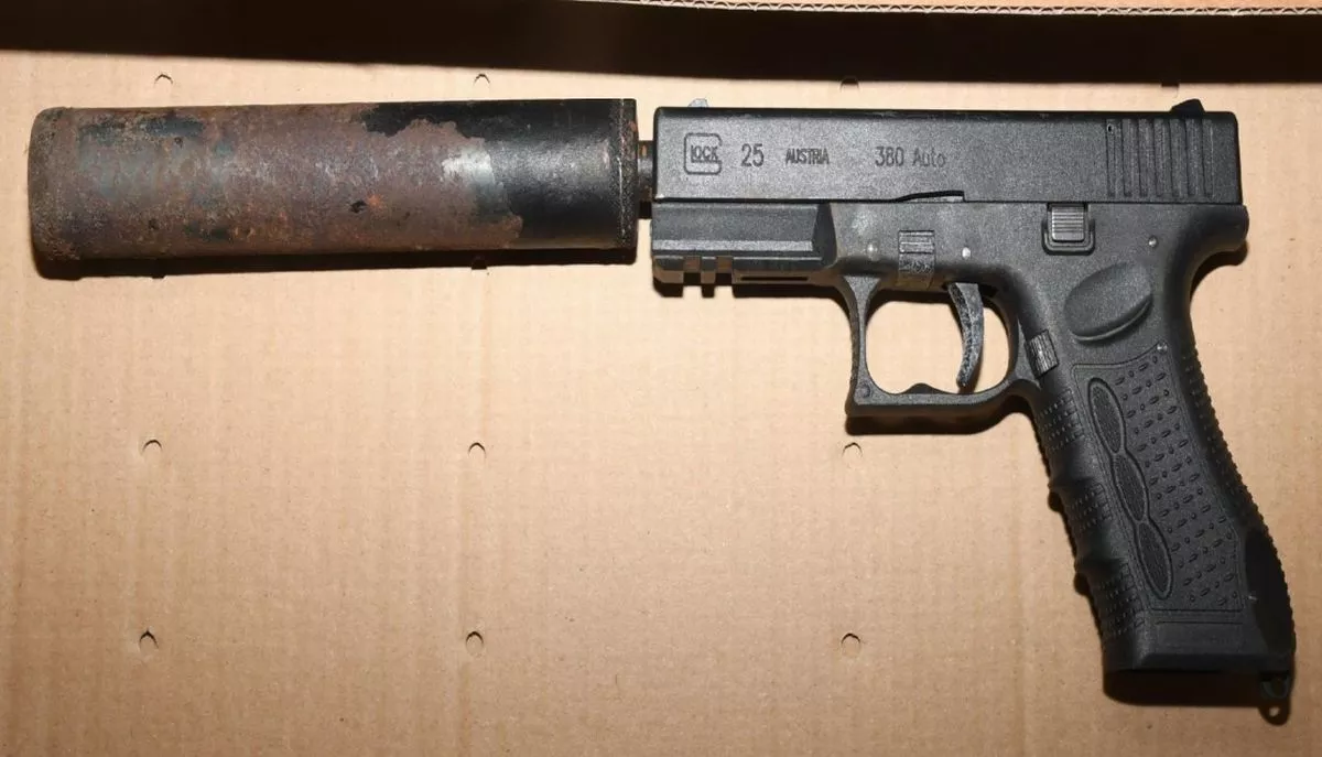 A converted Zoraki 917 blank-firing handgun, fitted with a silencer, which was discovered in woodland near to Rice Lane Recreation Ground