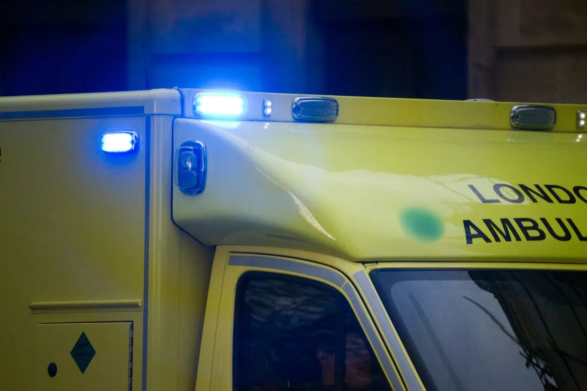 Ambulance with blue lights on
