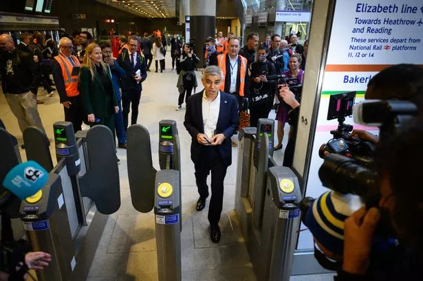 Mayor of London Sadiq Khan passes through Elizabeth line ticket barrier