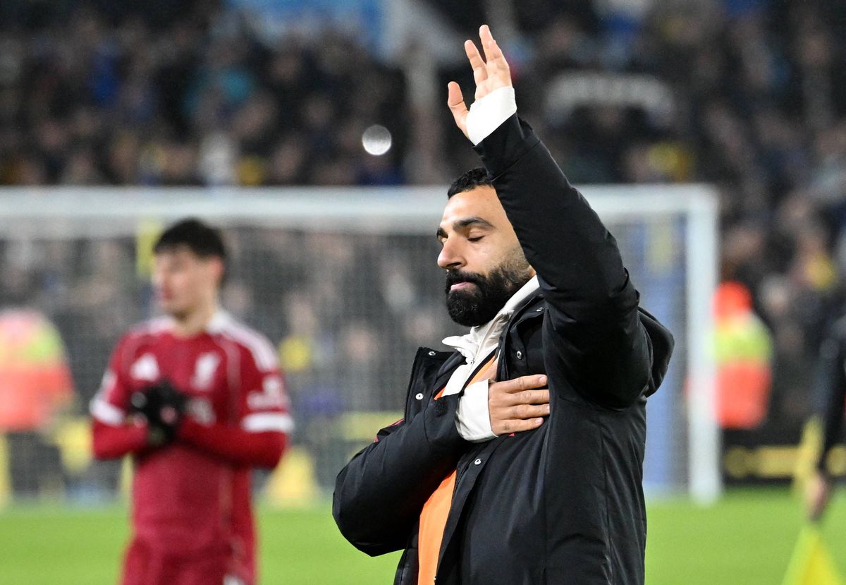 Mohamed Salah of Liverpool applauds the fans as he looks dejected following his team's draw in the Premier League match against Leeds