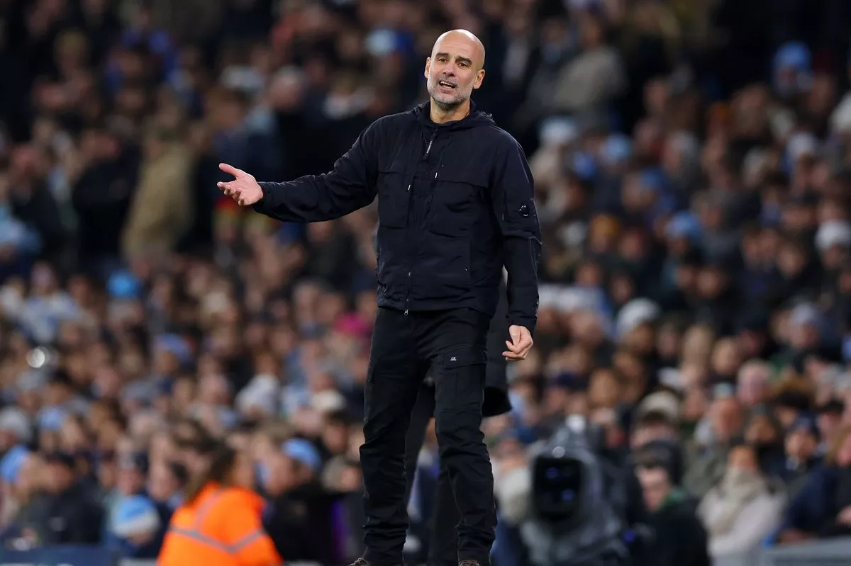 MANCHESTER, ENGLAND - DECEMBER 20: Pep Guardiola, Manager of Manchester City, reacts during the Premier League match between Manchester City and West Ham United at Etihad Stadium on December 20, 2025 in Manchester, England. (Photo by Molly Darlington/Getty Images)