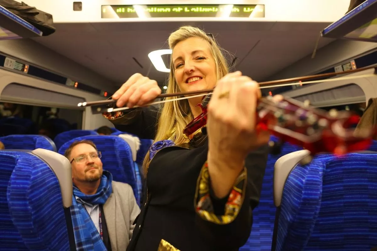 Storm Electric Strings performing onboard Lumo's new Glasgow service for customers and guests