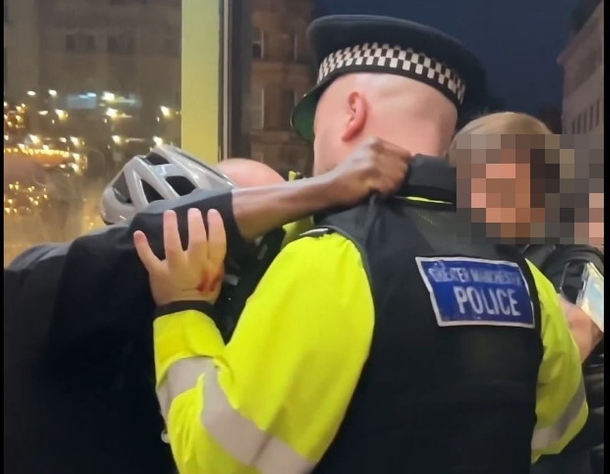 A man appears in a video being pepper sprayed by police
