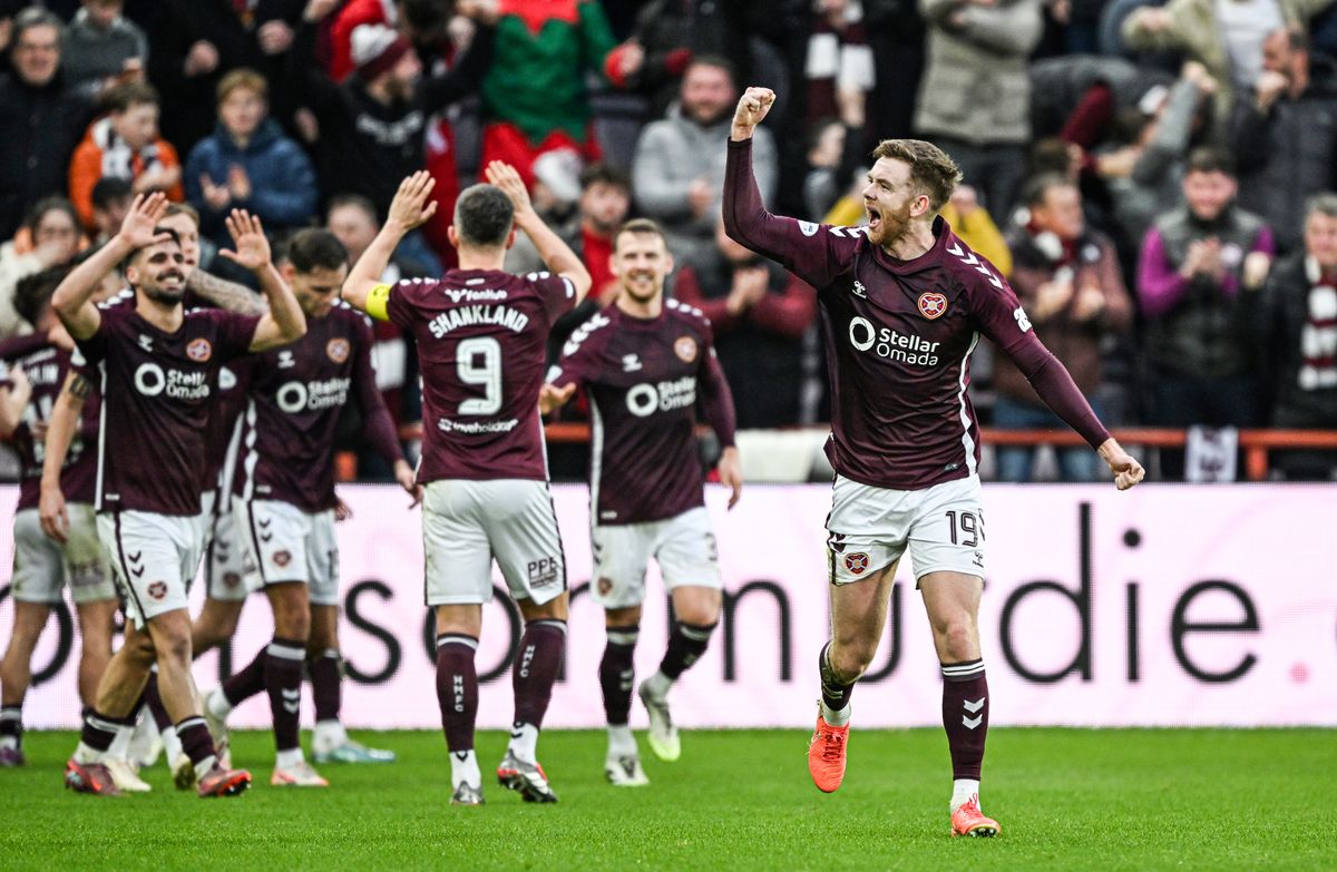 Hearts' Stuart Findlay celebrates after scoring against Rangers