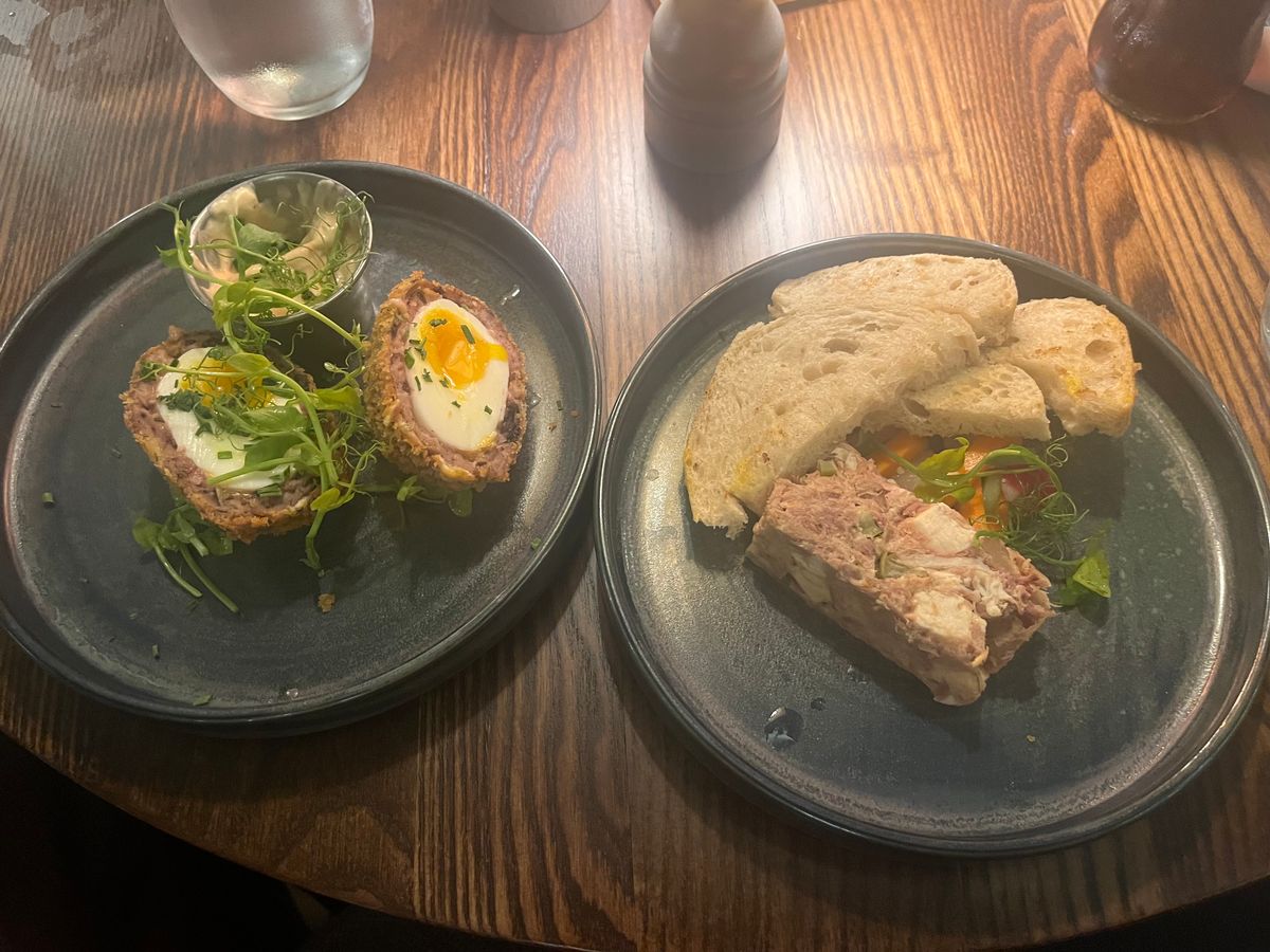 Scotch egg and ham hock terrine photo'd beside eachother