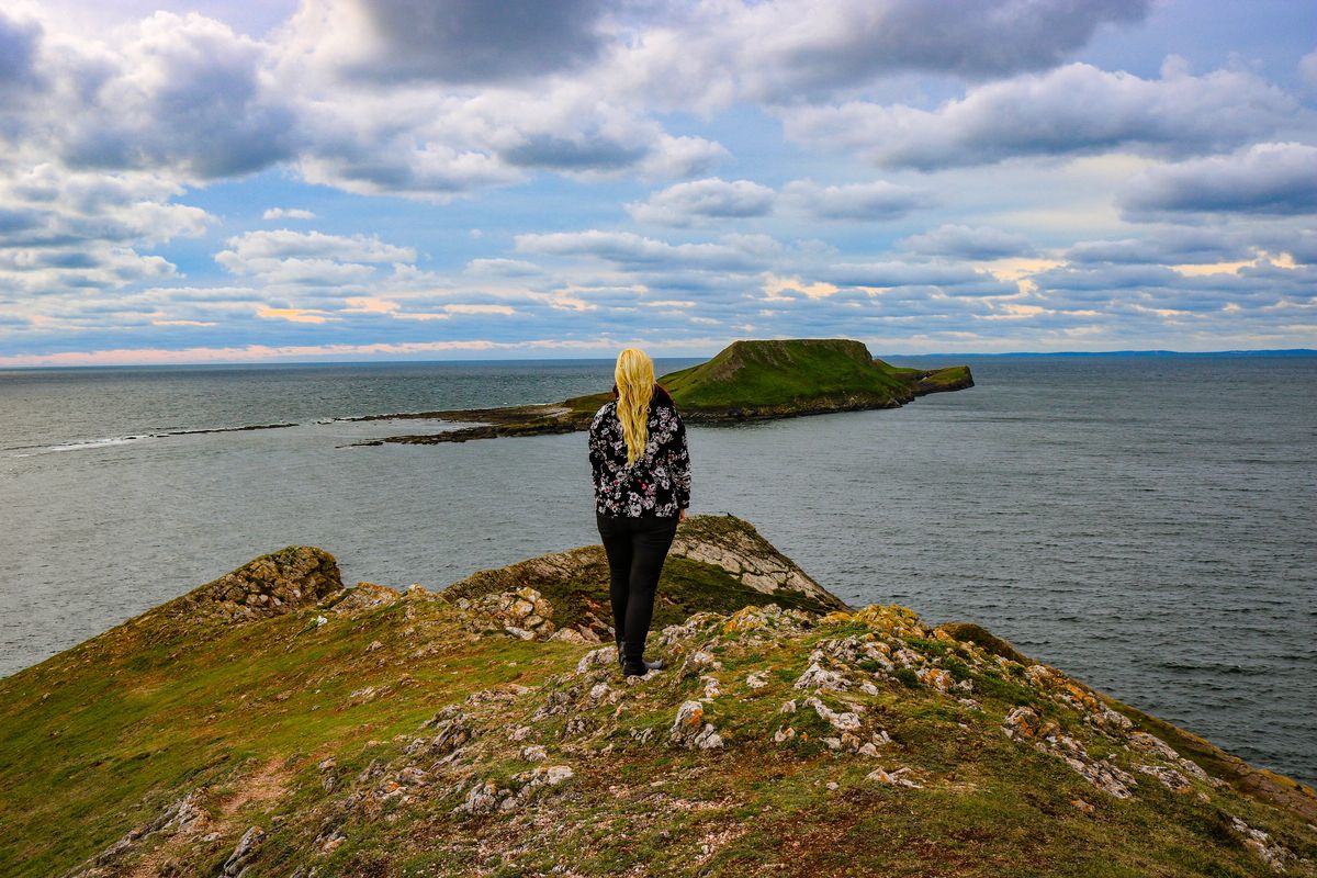 The Worms Head Walk is a family-friendly six-mile trail near the National Trust shop.