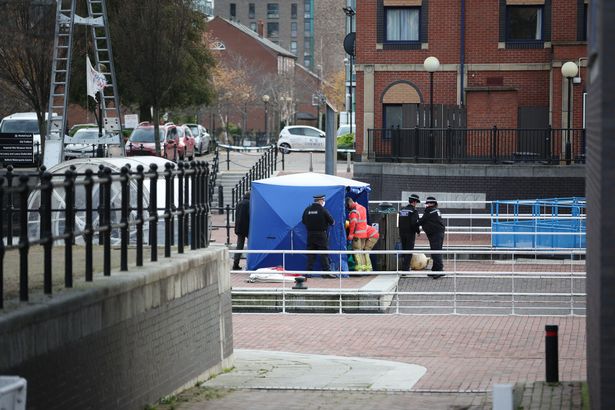 A forensic tent at Salford Quays after a body was found