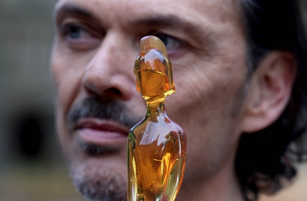 Matthew's BRIT Award represents the significance and the hardworking nature of Manchester and its worker bee mascot