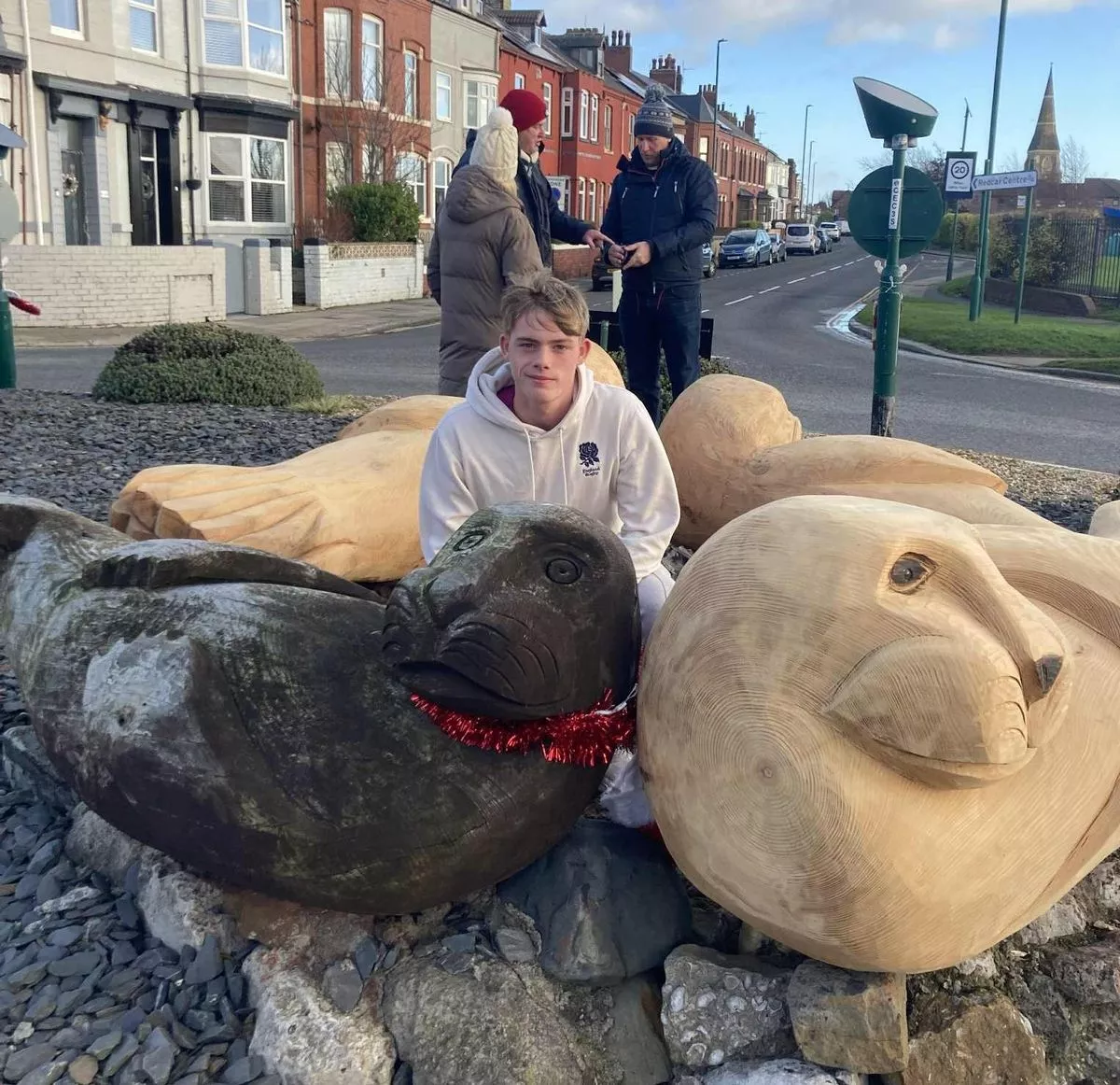 Resident Oliver Donnelly, 16, with the sculptures he and his grandmother decorate