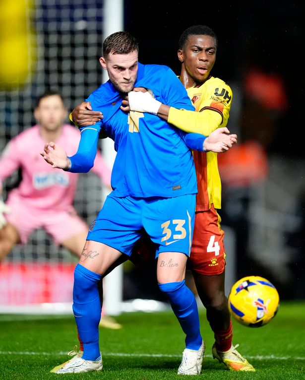 Birmingham City's Marvin Ducksch (left) and Watford's Kevin Keben battle for the ball