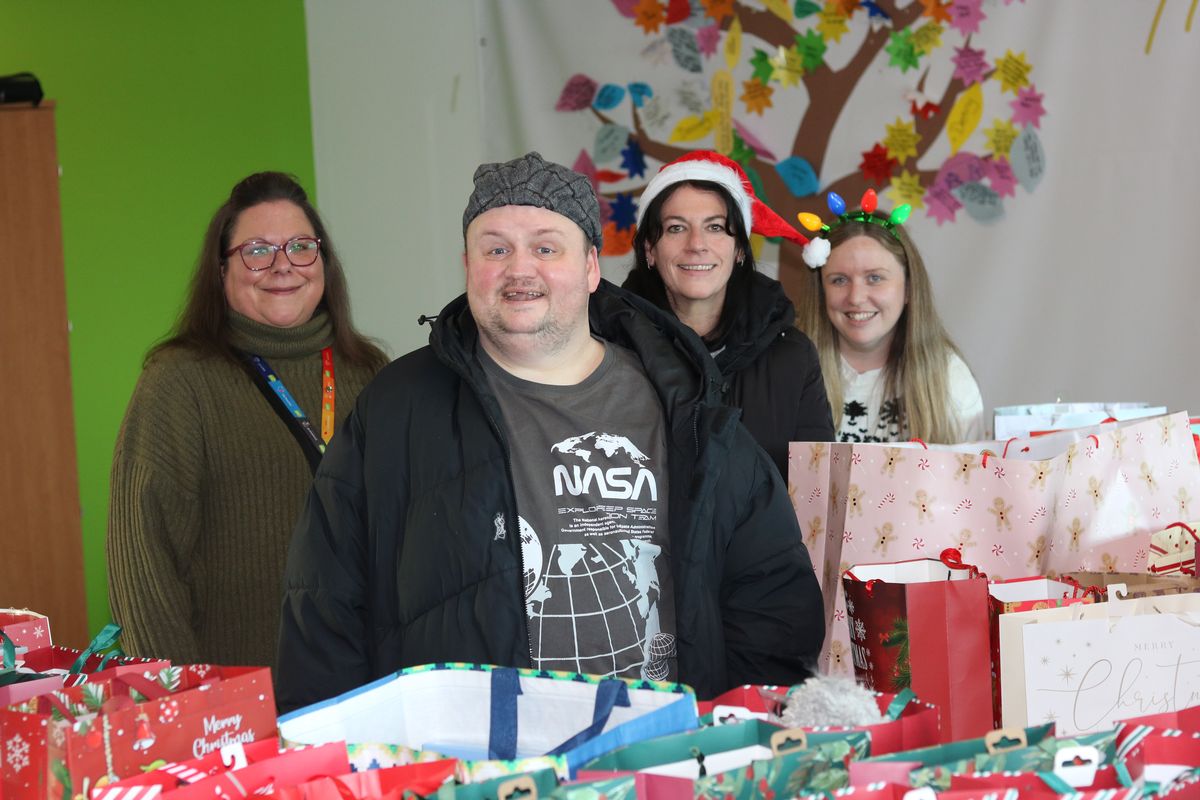 Ryan Batt, 42, from Kirkdale, who has got involved in a shoebox appeal to help people less fortunate than himself. Ryan is pictured with shoebox appeal staff.