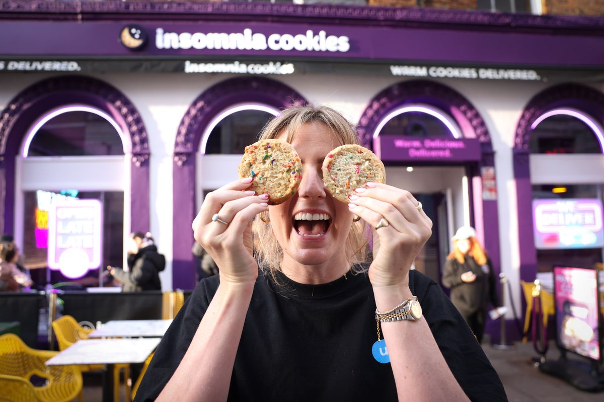 A customer with cookies at Insomnia Cookies on Slater St in Liverpool